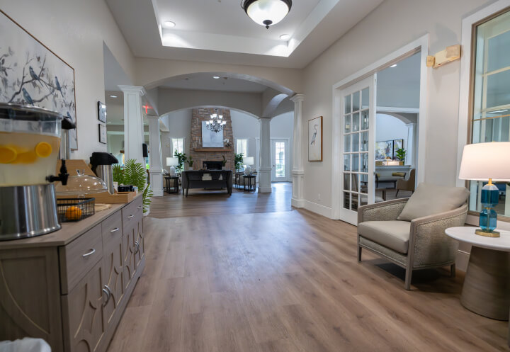 Interior Hallway with Refreshment Station and Arched Columns at Assisted Living Facility Interior Hallway with Refreshment Station and Arched Columns at Assisted Living Facility